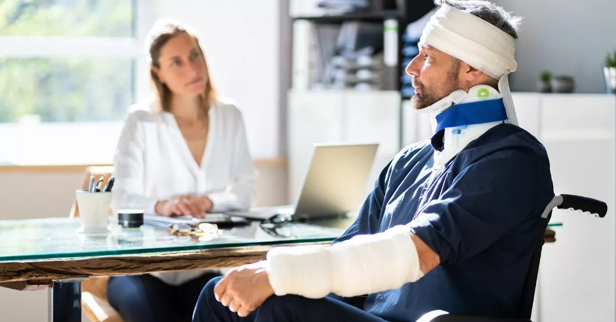 Injured accident victim meeting with a rideshare injury lawyer to discuss compensation and legal options.